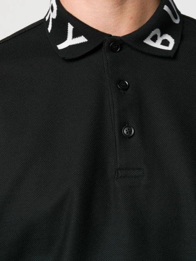 Shop Burberry Logo Collar Polo Shirt In Black