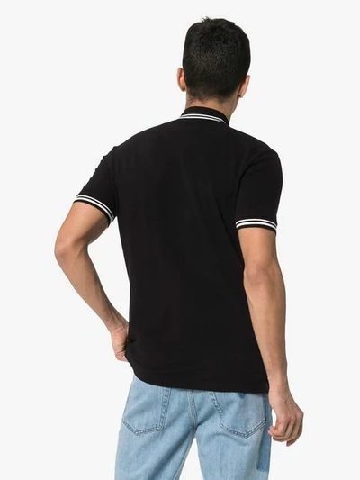 Shop Valentino Debossed Logo Stamp Cotton Polo Shirt In Black