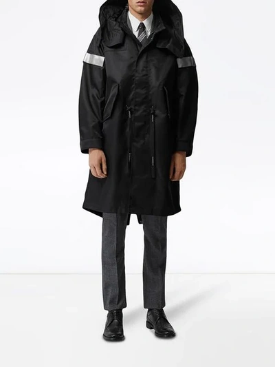 Shop Burberry Detachable Hood Reflective Stripe Nylon Parka In Black