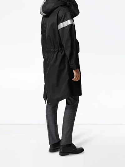 Shop Burberry Detachable Hood Reflective Stripe Nylon Parka In Black