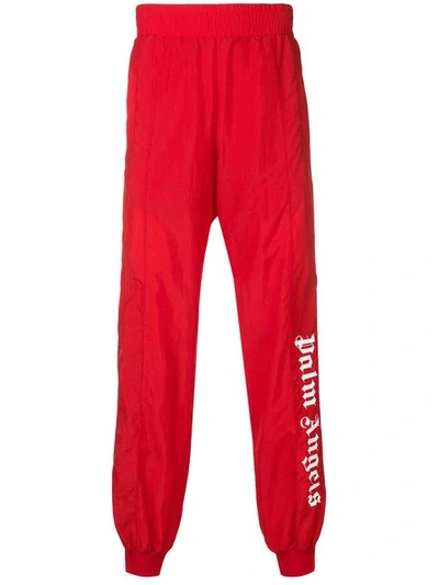 Shop Palm Angels Logo Print Side Stripe Joggers In Red