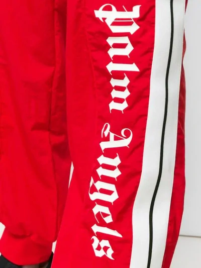 Shop Palm Angels Logo Print Side Stripe Joggers In Red