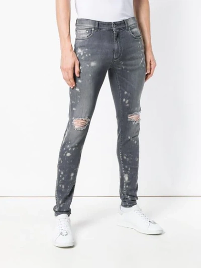 Shop Represent Distressed Skinny Jeans In Grey