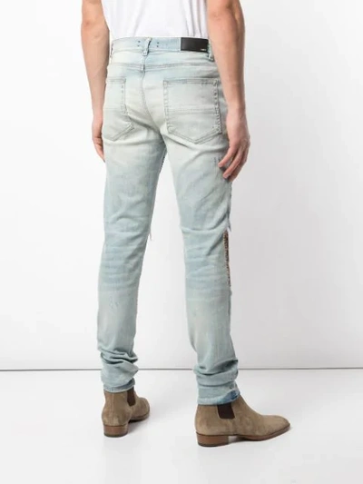 Shop Amiri Patched Slim Jeans In Blue
