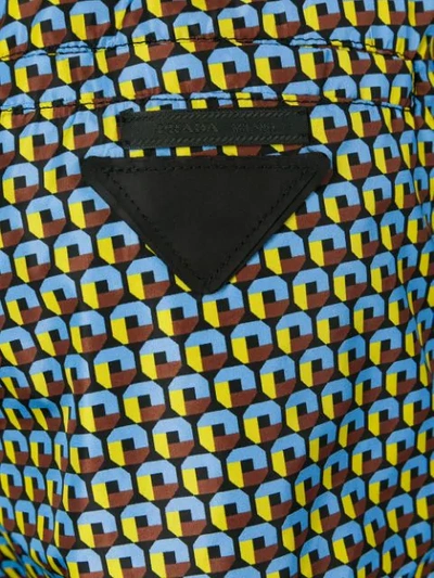 Shop Prada Geometric Print Swim Shorts In Black