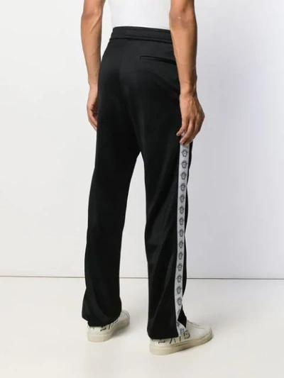 Shop Versace Medusa Stripe Track Trousers In Black