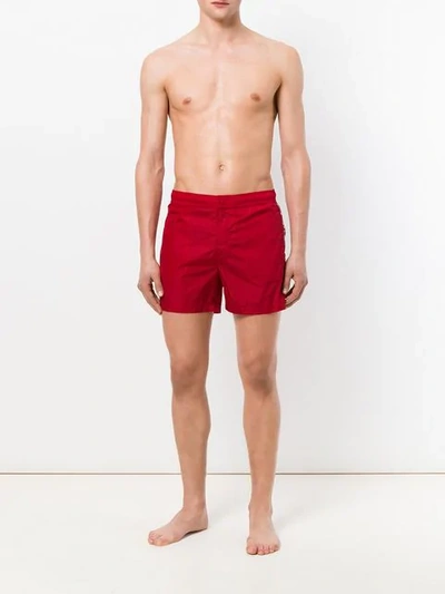 Shop Moncler Side Stripe Swim Shorts In Red