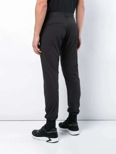 Shop Engineered For Motion Cooperator Track Pants In Black