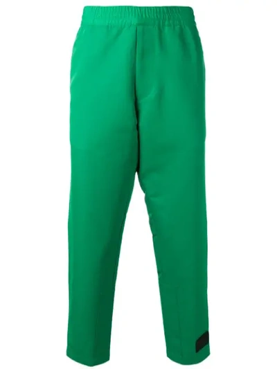 Shop Prada Cropped Track Style Trousers In Green