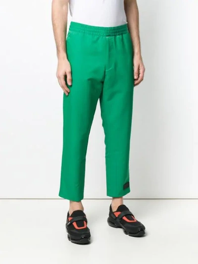Shop Prada Cropped Track Style Trousers In Green