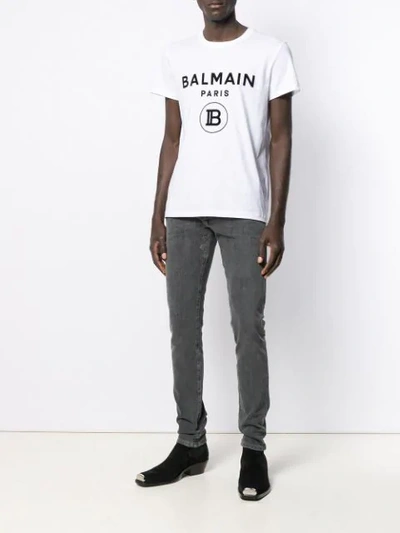 Shop Balmain Washed Effect Skinny Jeans In Black