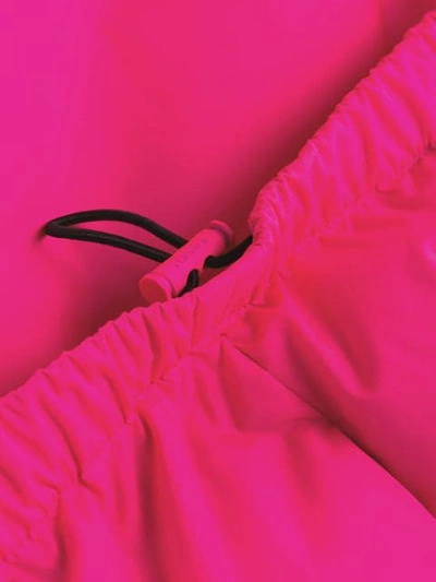 Shop Versace Puffer Logo Tape Gilet Jacket In Pink