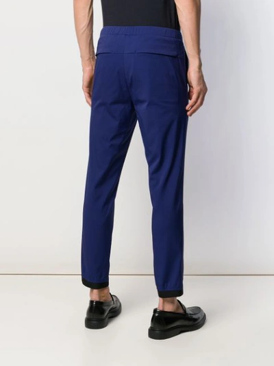 Shop Theory Tapered Trousers In Blue