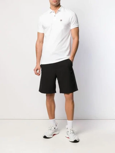 Shop Colmar Chest Logo Polo Shirt In White