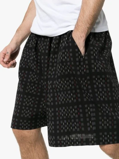 Shop Edward Crutchley Ikat Print Checked Drawstring Shorts In Black