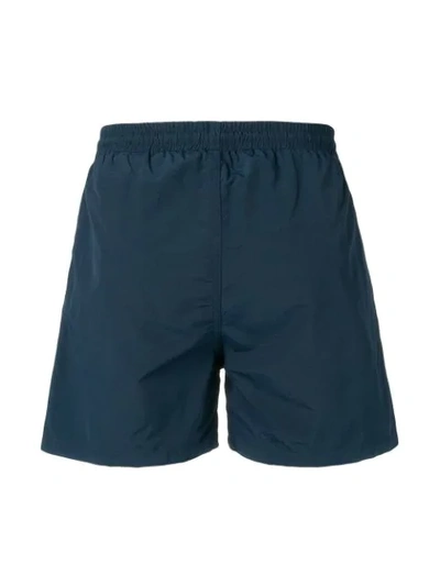 Shop Mcq By Alexander Mcqueen Swallow Swim Shorts In Blue
