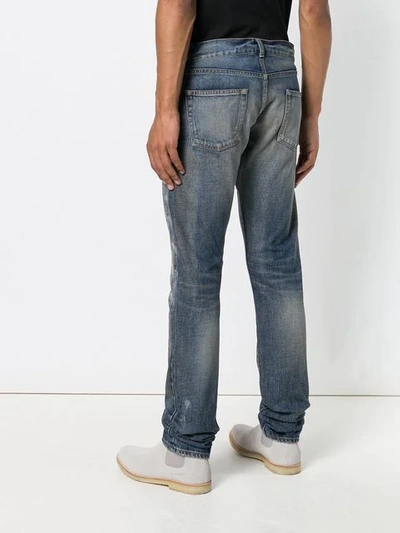 Shop Saint Laurent Paint Detail Slim Jeans In Blue
