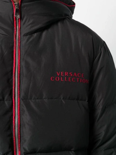 Shop Versace Zipped Padded Jacket In Black