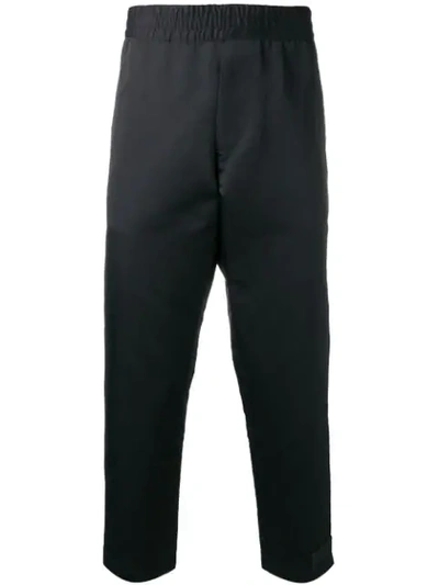 Shop Prada Cropped Track Style Trousers In Black