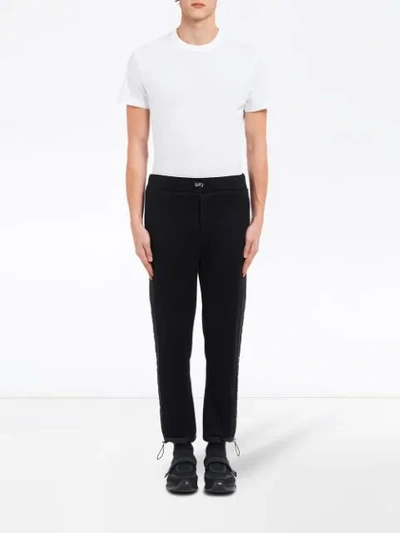 Shop Prada Cropped Drawstring Trousers In Black
