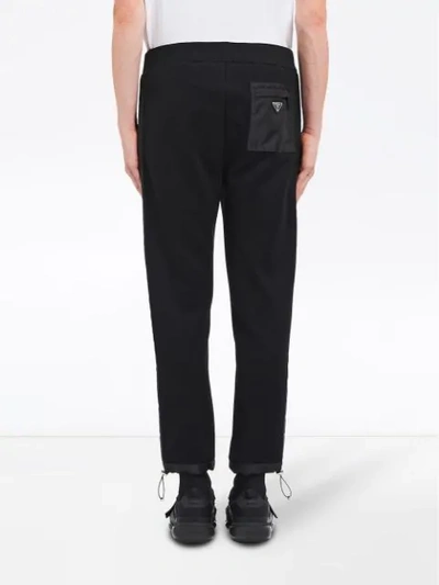 Shop Prada Cropped Drawstring Trousers In Black