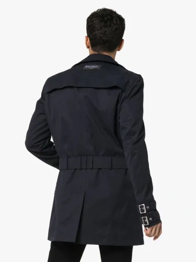 Shop Balmain Buckled Short Trench Coat In Blue