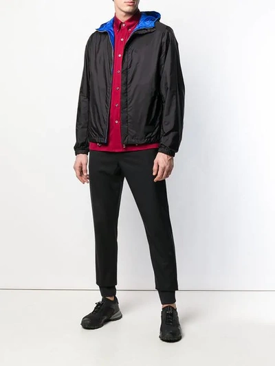 Shop Prada Hooded Windbreaker In Black