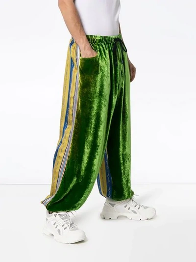 Shop Gucci Contrast Panel Loose-fit Velvet Track Pants In Green