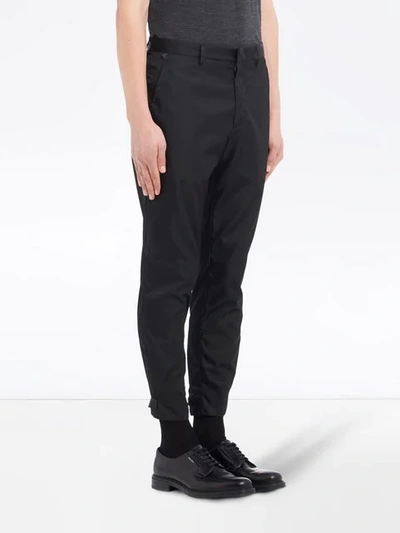 Shop Prada Nylon Trousers In Black