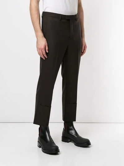 Shop Raf Simons Cropped Tailored Trousers In Brown