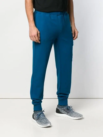 Shop C.p. Company Lens Track Pants In Blue