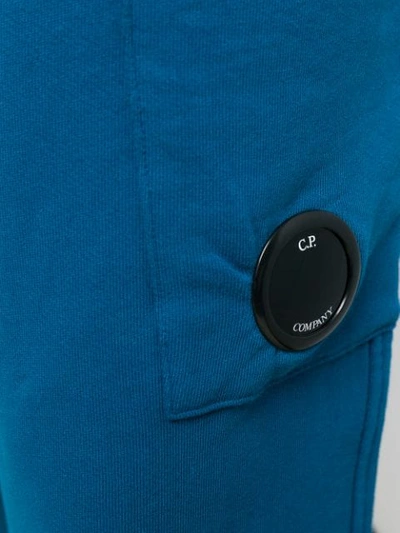 Shop C.p. Company Lens Track Pants In Blue