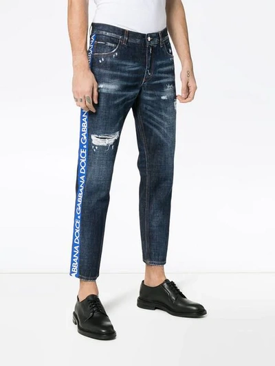 Shop Dolce & Gabbana Cropped Distressed Slim Ticker Jeans In Blue