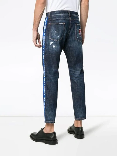 Shop Dolce & Gabbana Cropped Distressed Slim Ticker Jeans In Blue
