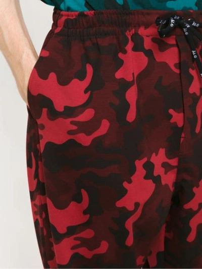 Shop Àlg Camouflage Print Track Pants In Red