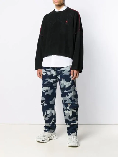 Shop Valentino Camouflage Denim Cargo Trousers In Blue