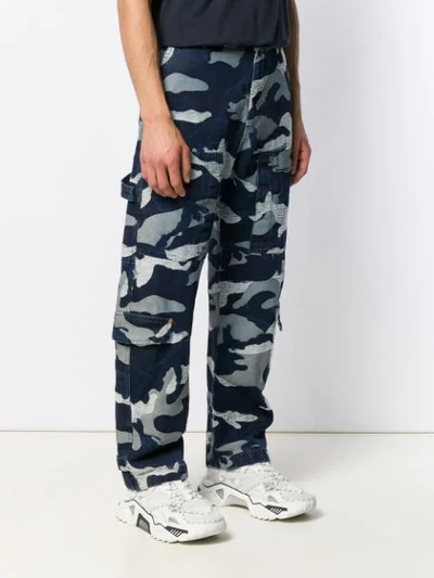 Shop Valentino Camouflage Denim Cargo Trousers In Blue