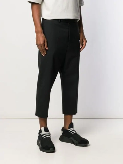 Shop Rick Owens Cropped Drop Crotch Trousers In Black