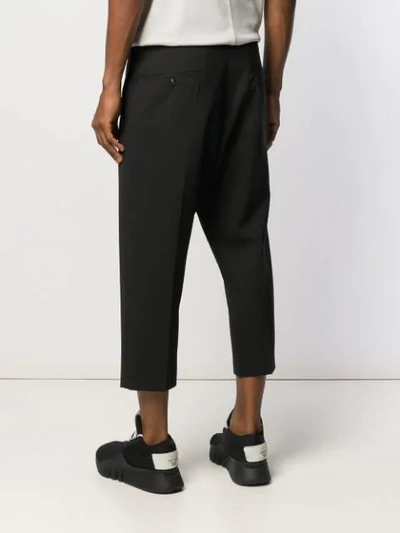 Shop Rick Owens Cropped Drop Crotch Trousers In Black