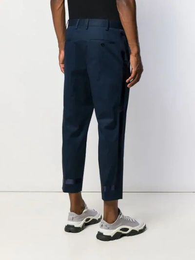 Shop Neil Barrett Slim-fit Cropped Trousers - Blue