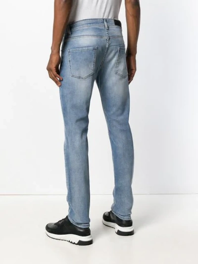 Shop Philipp Plein Slim Faded Jeans In Blue