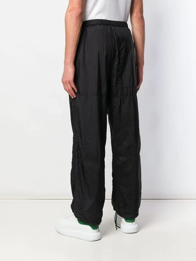 Shop Givenchy Logo Track Trousers In Black