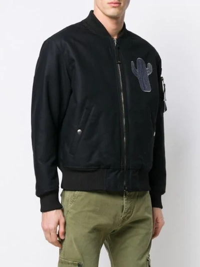 Shop Diesel Black Gold Padded Jacket With Hunting Embroidery In Black