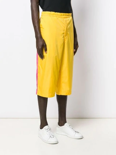 Shop Comme Des Garçons Shirt Side Panel Cropped Trousers In Yellow