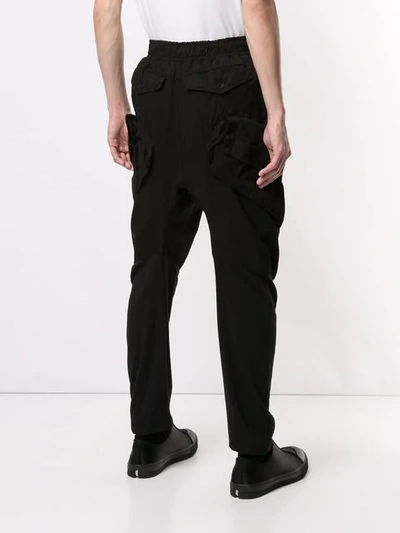 Shop Julius Tapered Leg Cargo Trousers In Black