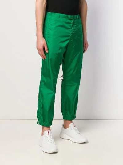 Shop Prada Drawstring Track Pants In Green