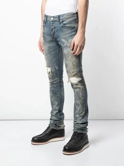 Shop Fagassent Dirty Distressed Skinny Jeans In Blue