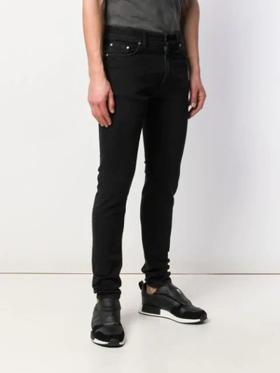 Shop Represent Slim Fit Jeans In Black