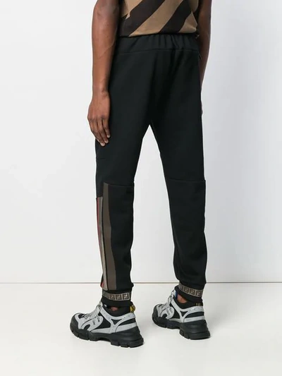 Shop Fendi Double F Track Pants In Black