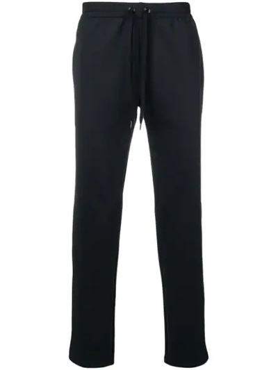Shop Versace Jogging Trousers In Black